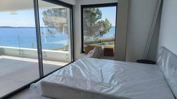 Thumbnail von Appartements neufs en bord de mer - avec terrasse sur le toit