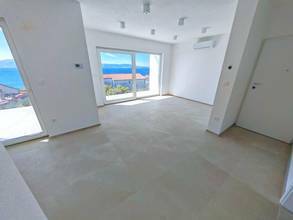 Thumbnail von Neubauwohnungen im obersten Stockwerk nahe dem Meer