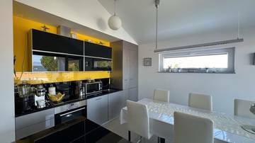 Thumbnail von Appartement mit Meerblick + Studio mit Garten