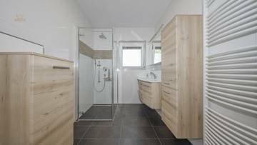 Thumbnail von Renditeobjekt - Eckreihenhaus am Fuße des Hahnenkamm