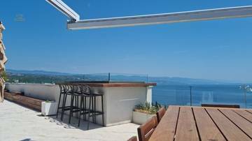 Thumbnail von Luxuriöses Penthouse mit privater Dachterrasse und traumhaftem Meerblick