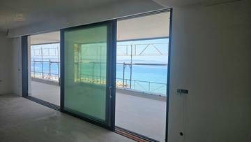 Thumbnail von Modernes Penthouse mit Dachterrasse in der 1. Reihe zum Meer