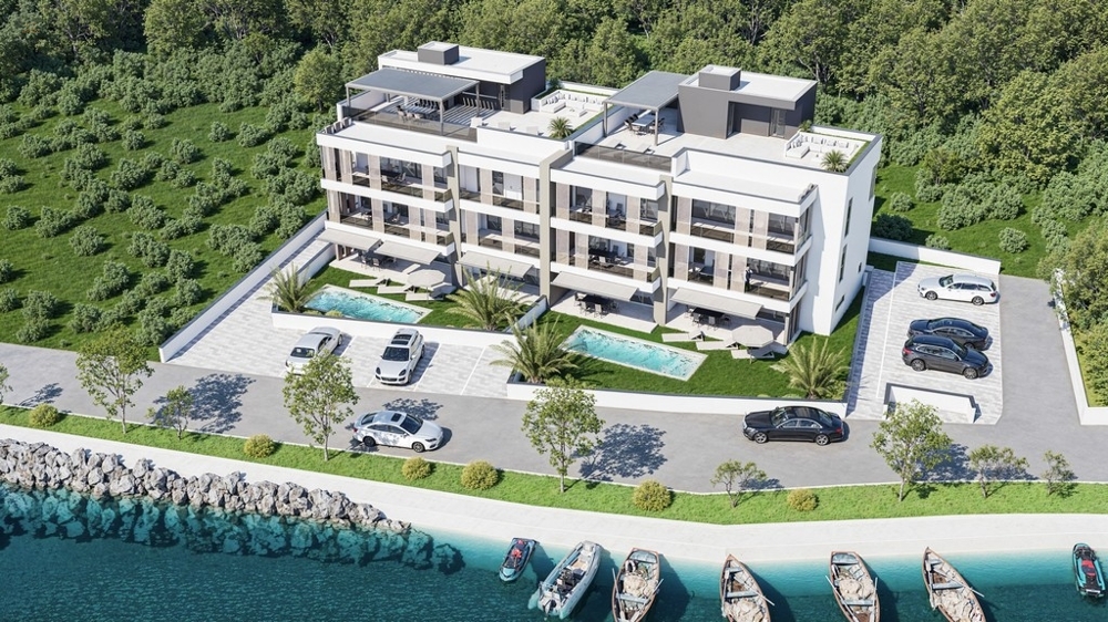 Modernes Penthouse mit Dachterrasse in der 1. Reihe zum Meer