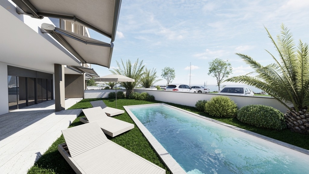 Exklusive Erdgeschosswohnung mit Garten und Pool - 1. Reihe zum Meer