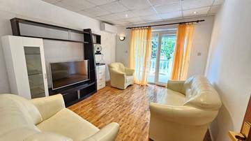 Thumbnail von Erdgeschosswohnung mit großer Terrasse nahe dem Meer