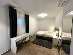 Thumbnail von Moderne Maisonettewohnung mit Garten und Swimmingpool