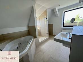 Thumbnail von Exquisites Terrassenhaus mit max. 3 Wohneinheiten in Eisenstadt, separates Baugrundstück – Ihr neues Zuhause mit Traumgarten, Naturpool und Weitblick!