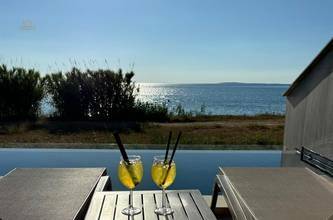 Thumbnail von Appartement mit Infinity-Pool nahe dem Meer