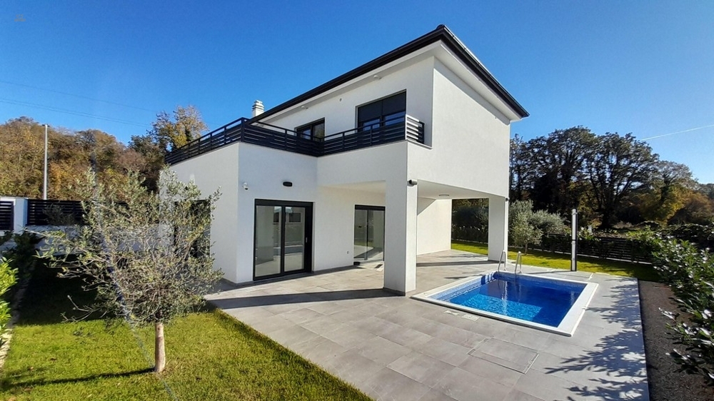 Modernes Haus mit Swimmingpool und Meerblick