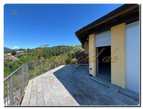 Thumbnail von Immogold Lago Maggiore Traumhafte Dachgeschosswohnung mit großer Terrasse, Stellplatz und Panorama-Seeblick, komplett renoviert