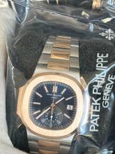 Thumbnail von Patek Philippe Nautilus Blue Ref Nr 5980/1AR-001-Single Sealed-Deutsch-Anonym-08/2021 Sofort