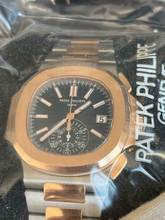 Thumbnail von Patek Philippe Nautilus Blue Ref Nr 5980/1AR-001-Single Sealed-Deutsch-Anonym-08/2021 Sofort