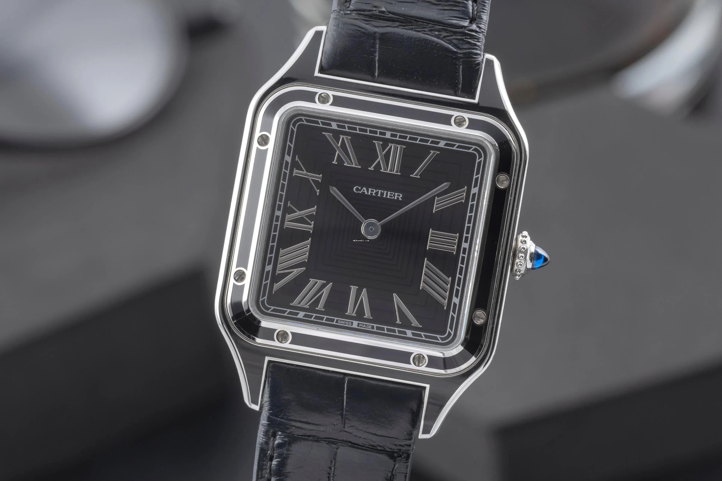 Cartier Santos Dumont Black Lacquer Handaufzug Herrenuhr Ref. WSSA0046 B&P 2023