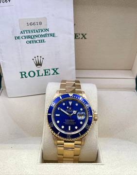  Rolex Submariner Date Blue D. FULL-GOLD 18KT. WITH PAPERS TOP CONDITION year:1997 