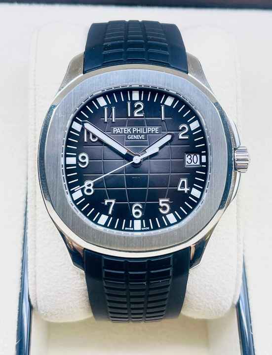  Patek Philippe Aquanaut (with first buying receipt) NEW,UNWORN + BOX&PAPERS + NEW Clasp and Movement 