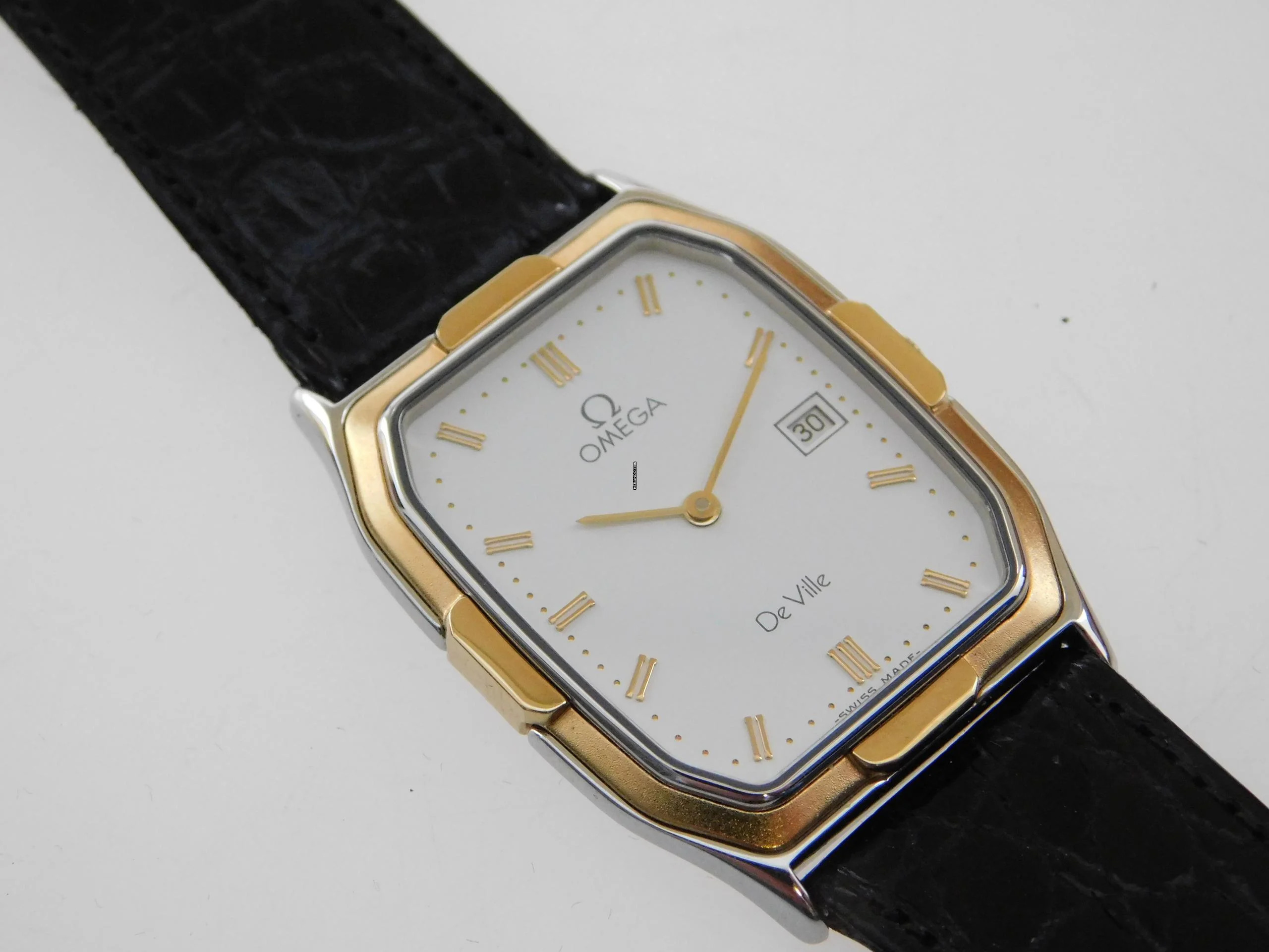 Omega De Ville Herrenuhr im Full Set nahezu N.O.S v 1987 incl Erstkaufrechnung seltene Version mit 18 Karat massiv Gelbgoldlünette
