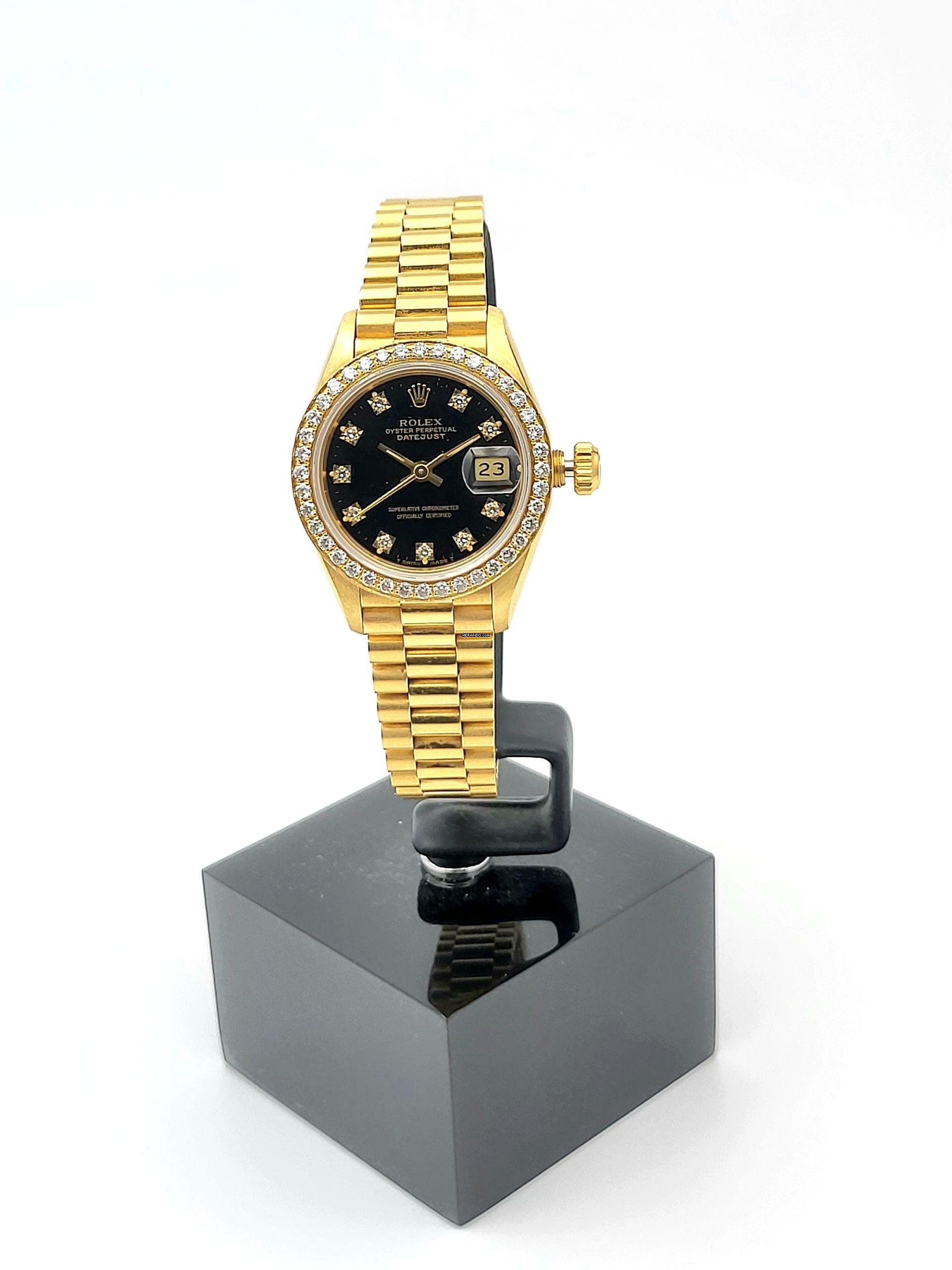 Rolex Lady-Datejust 18 Kt. Gold top condition serviced Factory diamonds