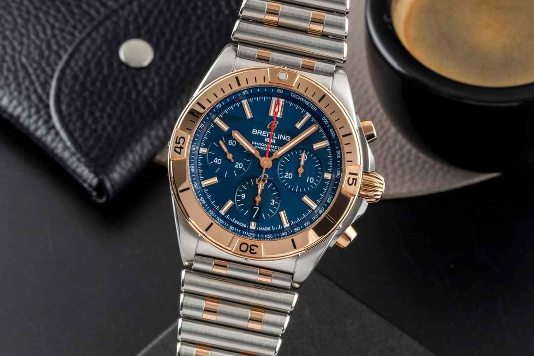  Breitling Chronomat Chronograph Stahl / Gold Automatik Ref UB0134101C1U1 Papiere 
