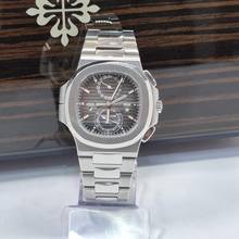 Thumbnail von Patek Philippe Nautilus Travel Time Flyback Chronograph 40,5 мм Полностью